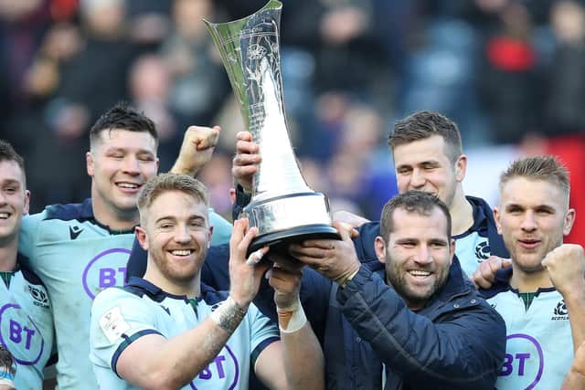 Kyle Steyn, left, and Fraser Brown lift the Auld Alliance Trophy after Scotland's win over France in the 2020 Guinness Six Nations at Murrayfield. Steyn made his international debut as a replacement. Picture: Ian MacNicol/Getty Images