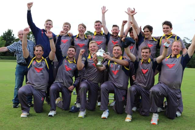 Heriot's lift the Scottish Cup after victory over Watsonians. Picture: Graham Caw