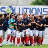 Falkirk celebrate their goal at Cove.