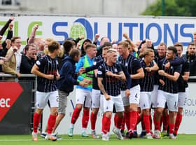 Falkirk celebrate their goal at Cove.