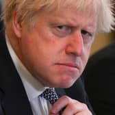 Boris Johnson removed a line from his foreword to the Ministerial Code that its 'precious principles... must be honoured at all times' (Picture: Daniel Leal/pool/AFP via Getty Images)