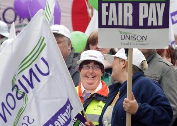 Striking local authority staff march through Edinburgh at a protest in 2008.