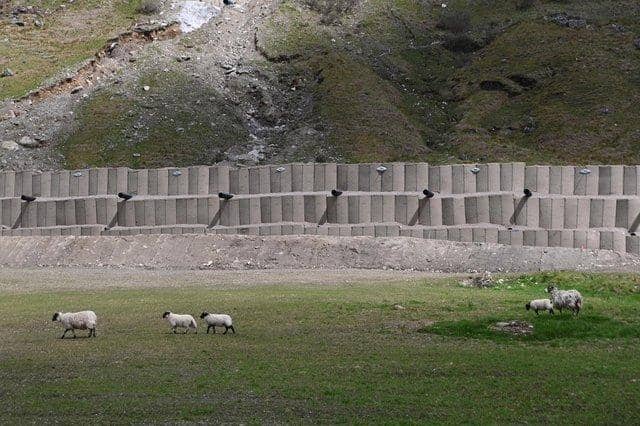 The 20ft-high bund built to protect the Old Military Road after it was engulfed by a landslide in 2020. (Photo by John Devlin/The Scotsman)