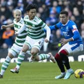 Rangers' James Tavernier tackles Celtic's Reo Hatate during the most recent Old Firm meeting at Ibrox.  (Photo by Alan Harvey / SNS Group)