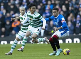 Rangers' James Tavernier tackles Celtic's Reo Hatate during the most recent Old Firm meeting at Ibrox.  (Photo by Alan Harvey / SNS Group)