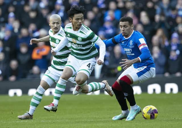 Rangers' James Tavernier tackles Celtic's Reo Hatate during the most recent Old Firm meeting at Ibrox. (Photo by Alan Harvey / SNS Group)