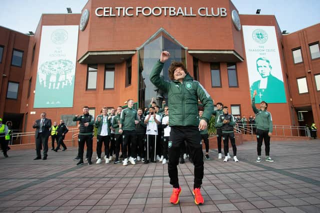 Kyogo Furuhashi leads the celebrations at Celtic Park after landing the title.
