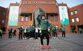 Kyogo Furuhashi leads the celebrations at Celtic Park after landing the title.