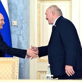 Russia's President Vladimir Putin and Belarus' President Alexander Lukashenko shake hands during a signing ceremony following a meeting of the Supreme State Council of the Union State of Russia and Belarus last month.