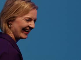 New Conservative Party leader and Britain's Prime Minister-elect Liz Truss leaves the stage after delivering a speech at an event to announce the winner of the Conservative Party leadership contest in central London. Picture: Adrian Dennis/AFP via Getty Images
