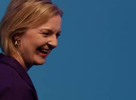 New Conservative Party leader and Britain's Prime Minister-elect Liz Truss leaves the stage after delivering a speech at an event to announce the winner of the Conservative Party leadership contest in central London. Picture: Adrian Dennis/AFP via Getty Images