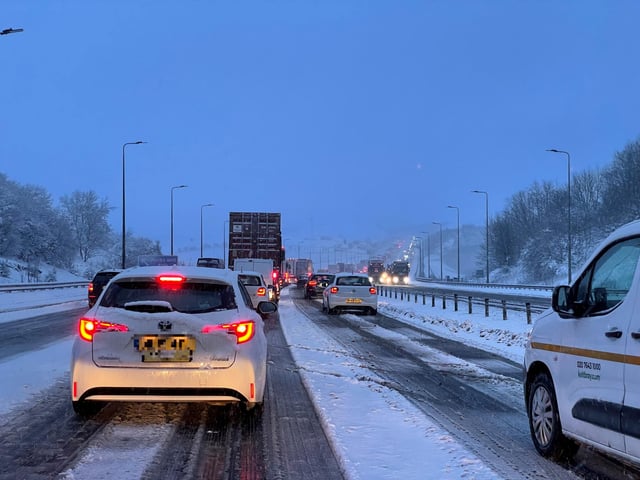 Traffic at a standstill on the M62 motorway near Kirklees, West Yorkshire, due to heavy snow in the area.