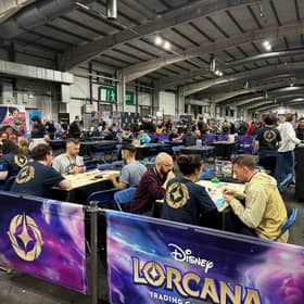 Play games based on popular media, like Disney Lorcana by Ravensburger.
