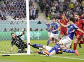 Japan's Kaoru Mitoma crosses for the second goal - but did the ball go out of play?