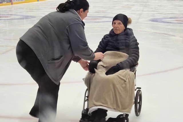 HC-One Scotland’s Ballumbie Court Care Home’s Wellbeing Coordinator Margaret (better known as Maggie) Pryde with resident Jane Reekie at the ice rink
