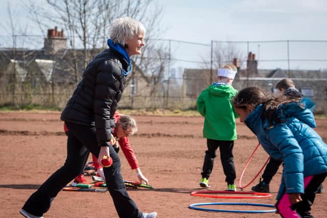 Judy Murray giving children tennis training in Maryhill Park, Glasgow, as part of her work with the Judy Murray Foundation, which is aiming to breathe life into tennis courts that were restored by volunteers.