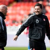 Aberdeen coach Liam Fox (right) and Steve Agnew (left) are a big part of Barry Robson's project at Pittodrie.