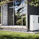 Heat pump installed at the wall of a detached family house. Picture: Getty Images