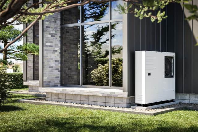 Heat pump installed at the wall of a detached family house. Picture: Getty Images