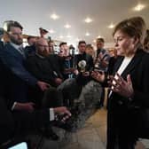 Former first minister Nicola Sturgeon talking to the media as she returned to the Scottish Parliament. Picture: Andrew Milligan/PA Wire