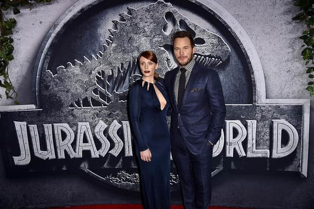 Actors Bryce Dallas Howard (L) and Chris Pratt will reprise their roles in Jurassic World Dominion (Photo by Kevin Winter/Getty Images)