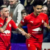 Falkirk's Callumn Morrison silences the home fans after scoring his side's second in the 5-1 win over Darvel in the Scottish Cup fifth round. (Photo by Rob Casey / SNS Group)