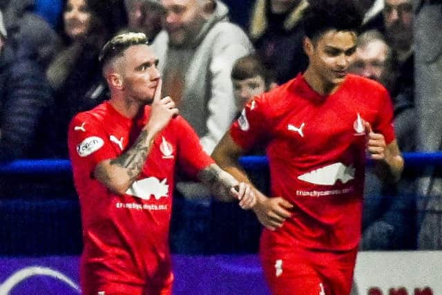 Falkirk's Callumn Morrison silences the home fans after scoring his side's second in the 5-1 win over Darvel in the Scottish Cup fifth round. (Photo by Rob Casey / SNS Group)