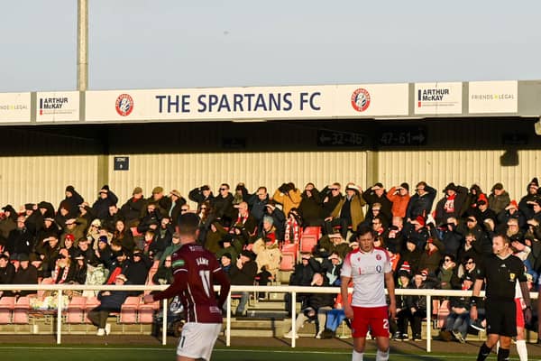 Spartans fans watch on from the stands during the League Two defeat to Stenhousemuir at Ainslie Park on Saturday - one week ahead of hosting Hearts in the Scottish Cup. (Photo by Rob Casey / SNS Group)