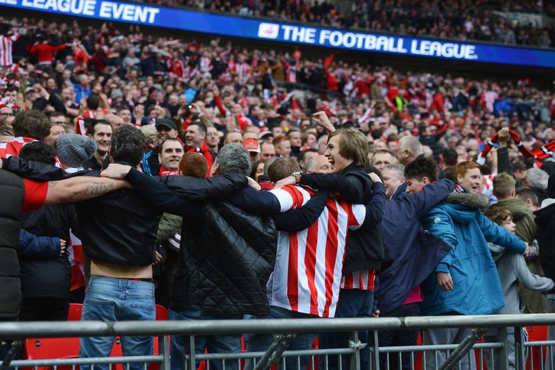 Sunderland fans celebrate during the Capital One Cup final between Manchester City and Sunderland at Wembley Stadium on March 2, 2014 in London, England.