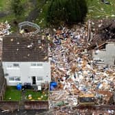 The blast site remains fenced off, with three of the four worst-affected houses knocked down while one stands empty