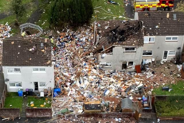 The blast site remains fenced off, with three of the four worst-affected houses knocked down while one stands empty