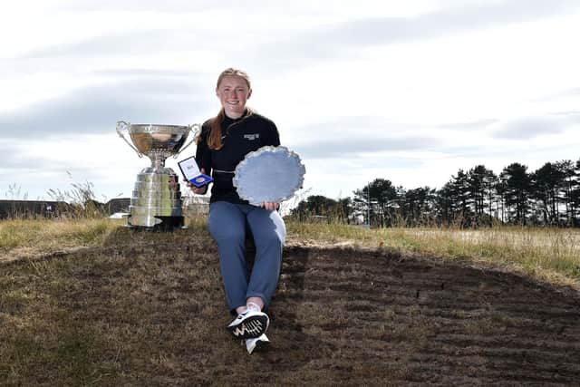 Louise Duncan poses with the trophy following her win in the final of the R&A Womens Amateur Championship at Kilmarnock (Barassie). Picture: Charles McQuillan/R&A/R&A via Getty Images.