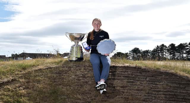Louise Duncan poses with the trophy following her win in the final of the R&A Womens Amateur Championship at Kilmarnock (Barassie). Picture: Charles McQuillan/R&A/R&A via Getty Images.