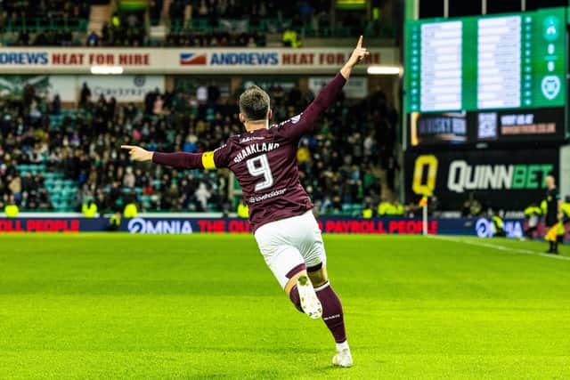 Hearts' Lawrence Shankland celebrates his late winner against Hibs.