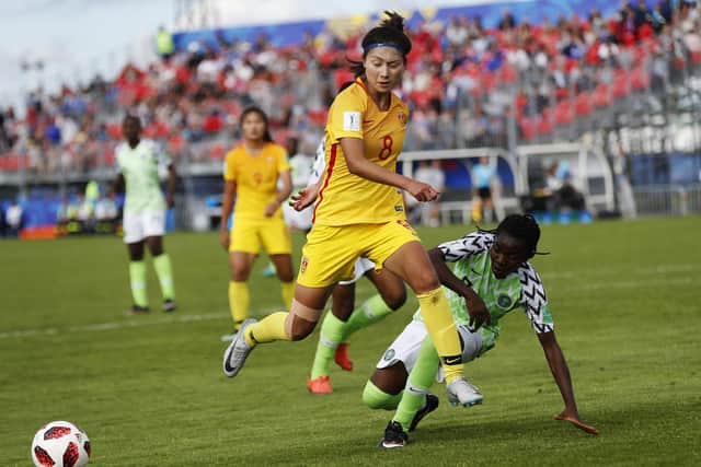 China midfielder Shen Mengyu, left, has signed for Celtic Women.