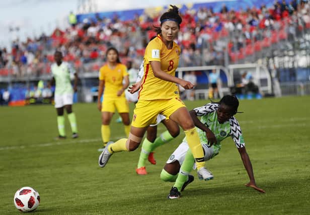 China midfielder Shen Mengyu, left, has signed for Celtic Women.