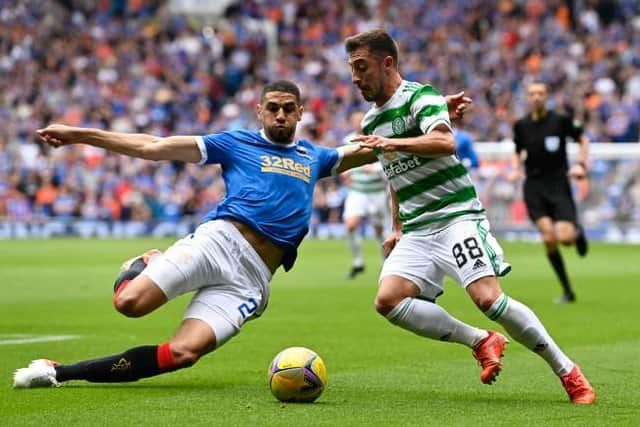 Rangers' man of the match Leon Balogun challenges Celtic debutant Josip Juranovic during Sunday's Old Firm clash at Ibrox. (Photo by Rob Casey / SNS Group)