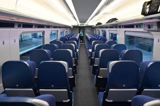 Lumo's carriages have few seats round tables and some with no view, but reading lights above the fold-down seatback tables. Picture: John Devlin