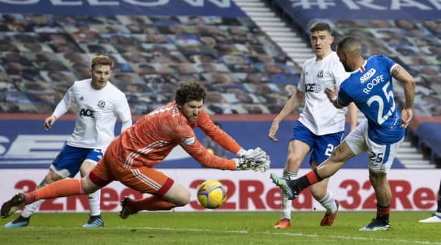 Kemar Roofe (R) makes it 2-0 during a Scottish Cup Third Round tie between Rangers and Cove Rangers at Ibrox Stadium, on April 04, 2021, in Glasgow, Scotland. (Photo by Alan Harvey / SNS Group)