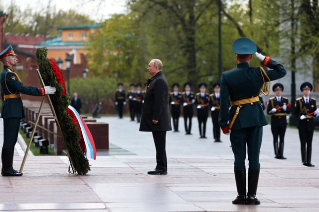 Russian President Vladimir Putin attends a wreath-laying ceremony at the Tomb of the Unknown Soldier after the Victory Day military parade in central Moscow on May 9, 2022. - Russia celebrates the 77th anniversary of the victory over Nazi Germany during World War II. Picture, Anton Novoderezhkin / Getty.