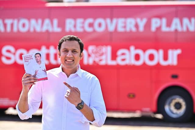 Scottish Labour Party leader Anas Sarwar poses for pictures following the launch of his manifesto for the Scottish Parliament election at Custom House Quay in Greenock.