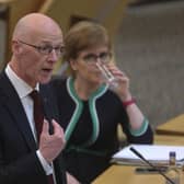 John Swinney told MSPs not to shout at him during testy exchanges in the Scottish Parliament over two delayed and over-budget ferries being built for Calmac (Picture: Fraser Bremner/Scottish Daily Mail/pool/PA)