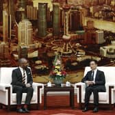 British Foreign Secretary James Cleverly, left, and Chinese Vice President Han Zheng attend a meeting at the Great Hall of the People in Beijing.