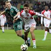 Matt O'Riley in action on his Denmark debut during the 2-0 defeat to Northern Ireland. (Photo by PAUL FAITH/AFP via Getty Images)