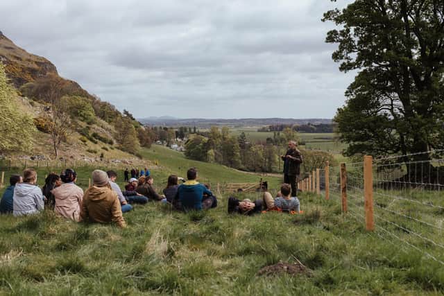 A team talk at Dumyat estate, where the Future Forest Company is carrying out large-scale nature restoration to help battle climate change and increase biodiversity while also improving access for visitors. Picture: Jen Scott