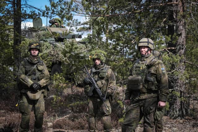 Finnish soldiers take part in a military exercise in Finland, held with troops from the UK, Latvia, Estonia and the US, earlier this month (Picture: Alessandro Rampazzo/AFP via Getty Images)