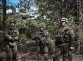 Finnish soldiers take part in a military exercise in Finland, held with troops from the UK, Latvia, Estonia and the US, earlier this month (Picture: Alessandro Rampazzo/AFP via Getty Images)