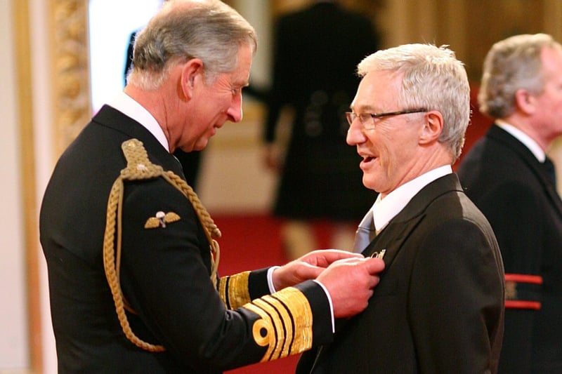 Paul O'Grady being made a Member of the Order of the British Empire by the then Prince of Wales (now King Charles III), at Buckingham Palace, central London.