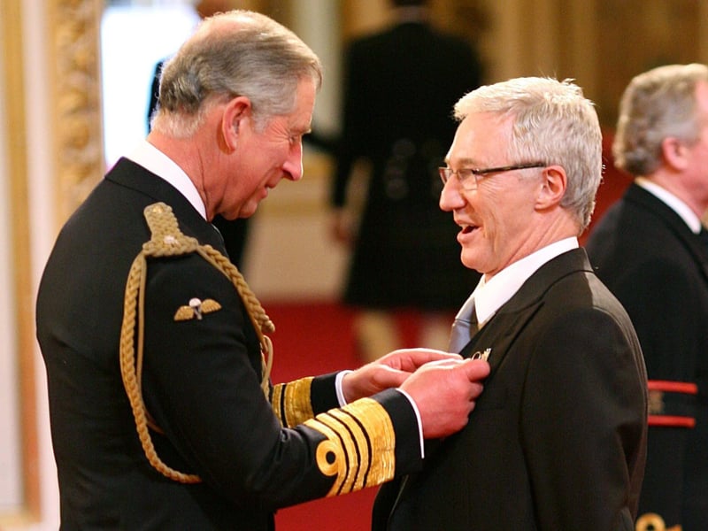 Paul O'Grady being made a Member of the Order of the British Empire by the then Prince of Wales (now King Charles III), at Buckingham Palace, central London.