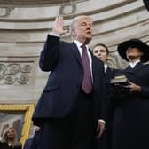 Donald Trump is sworn in as the 47th president of the United States by Chief Justice John Roberts as Melania Trump holds the Bible (Picture: Morry Gash/Pool/AFP via Getty Images)